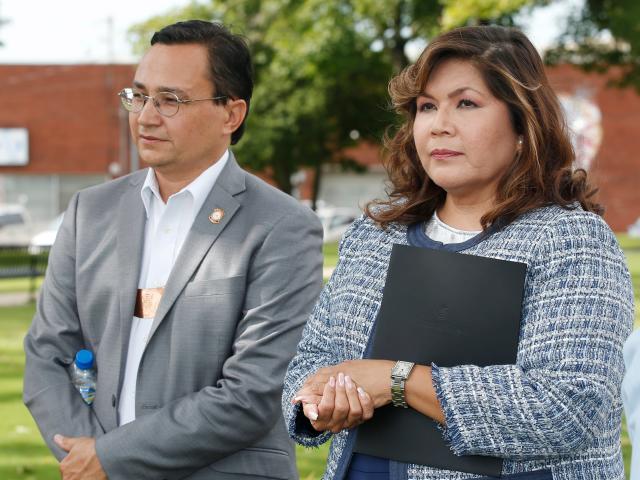 Cherokee Nation Principal Chief Chuck Hoskin Jr., left, and Kimberly Teehee, right, wait for a news conference to begin in Tahlequah, Okla., Thursday, Aug. 22, 2019.