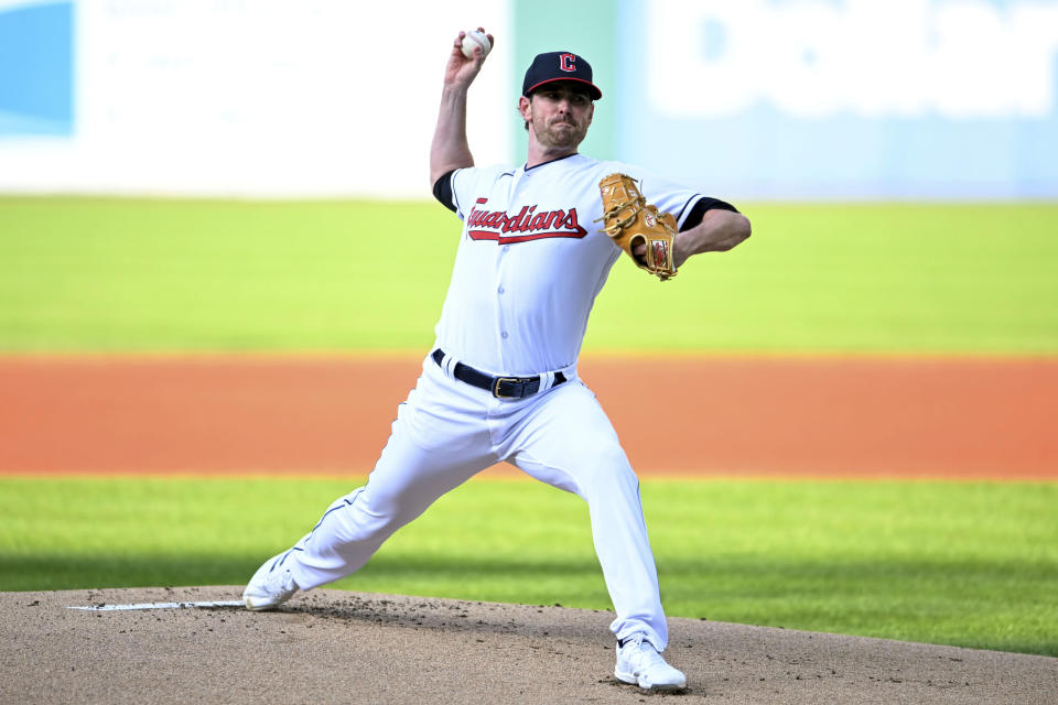 Cleveland Guardians starting pitcher Shane Bieber delivers during the first inning of a baseball game against the Detroit Tigers, Tuesday, May 9, 2023, in Cleveland. (AP Photo/Nick Cammett)