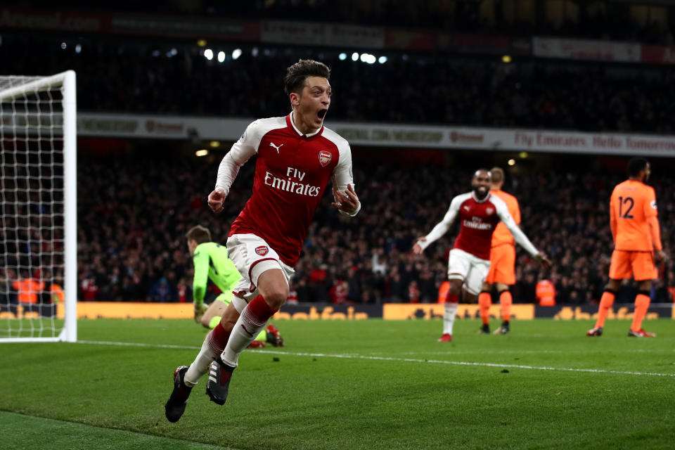 Mesut Ozil celebrates the goal that completed Arsenal’s stunning comeback. (Getty)