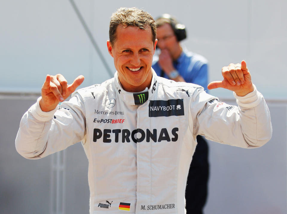 Michael Schumacher of Germany and Mercedes GP celebrates setting the fastest time before his five place grid penalty during qualifying for the Monaco Formula One Grand Prix at the Circuit de Monaco on May 26, 2012 in Monte Carlo, Monaco. (Paul Gilham/Getty Images)