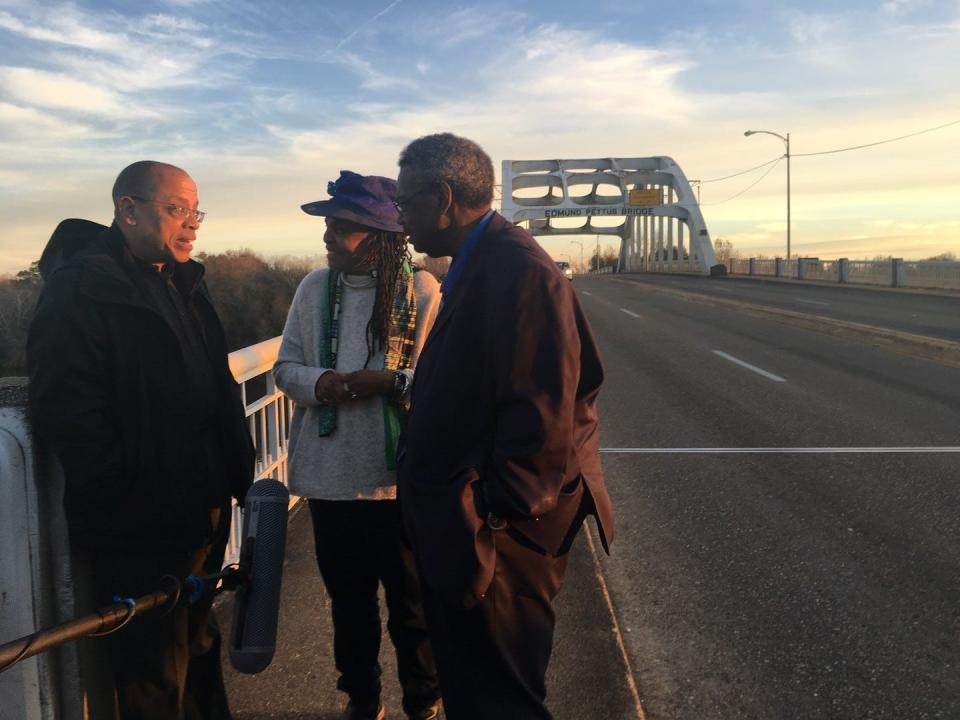 Jeffery Robinson with Alabama's first Black woman judge, Faya Ora Rose Touré, and her husband, Alabama State Sen. Hank Sanders, on the Edmund Pettus Bridge in Selma, Alabama, during the shooting of "Who We Are: A Chronicle of Racism in America."