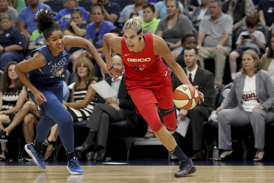 FILE - In this Aug. 16, 2019, file photo, Washington Mystics' Elena Delle Donne drives against Minnesota Lynx's Damiris Dantas (92) during a WNBA basketball game in Minneapolis. Delle Donne was named the Associated Press WNBA Player of the Year, Wednesday, Sept. 11, 2019. (David Joles/Star Tribune via AP, File)