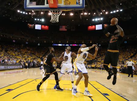 Jun 4, 2017; Oakland, CA, USA; Cleveland Cavaliers forward LeBron James (23) shoots against Golden State Warriors forward David West (3) during the second half in game two of the 2017 NBA Finals at Oracle Arena. Mandatory Credit: Ezra Shaw/Pool Photo via USA TODAY Sports