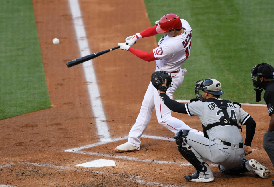 Shohei Ohtani hits a solo home run against the Chicago White Sox on Sunday.