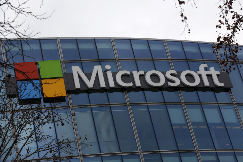 The logo of Microsoft is displayed outside the headquarters in Paris, Friday, Jan. 8, 2021. As the pandemic raged through the U.S., Microsoft's business continued chugging ahead and beat Wall Street expectations for the last three months of 2020, powered by ongoing demand for its workplace software and cloud computing services as people worked from home. The company on Tuesday, Jan. 26, 2021 reported fiscal second-quarter profit of $15.5 billion, up 33% from the same period last year. (AP Photo/Thibault Camus, file)