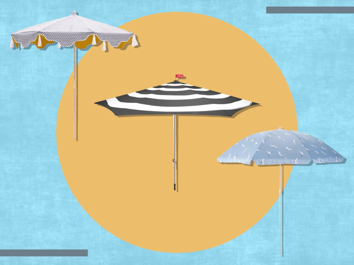 Giving you both shade and a stylish focal point, no patio set-up is complete without a garden brolly (iStock/The Independent)