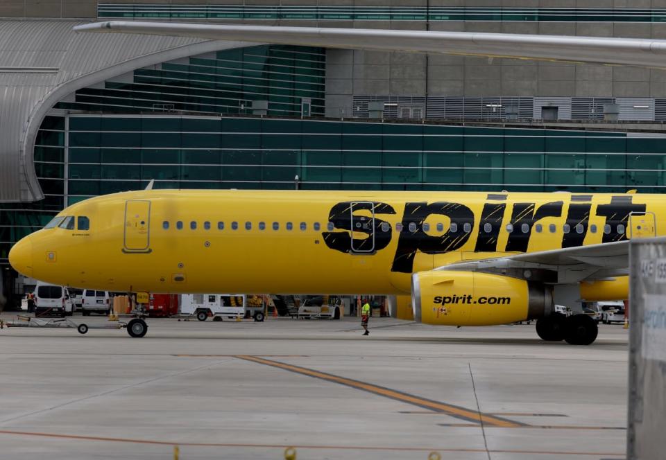 A Spirit airlines plane is pushed back from the gate on July 27, 2022 at Miami International Airport in Miami. (Photo by Joe Raedle/Getty Images)