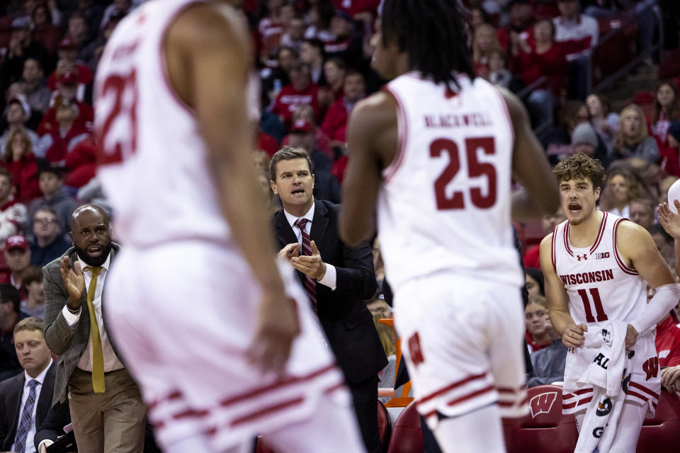 Wisconsin guard Max Klesmit (11) cheers for teammates during the second half of an NCAA college basketball game against Robert Morris in Madison, Wis., Friday, Nov. 17, 2023. (Samantha Madar/Wisconsin State Journal via AP)