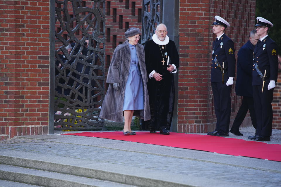 Queen Margrethe after a visit to her father King Frederik IX's grave outside Roskilde Cathedral in Roskilde, Denmark, Friday Jan. 14, 2022. Denmark’s popular monarch Queen Margrethe is marking 50 years on the throne with low-key events. The public celebrations for Friday's anniversary have been delayed until September due to the pandemic. The 81-year-old will, however, lay flowers on the grave of her parents at Roskilde cathedral, west of Copenhagen, where Danish royals have been buried since 1559. (Martin Sylvest/Ritzau Scanpix via AP)