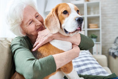 <span class="caption">Research shows that pets may support mental health for some people.</span> <span class="attribution"><a class="link " href="https://www.shutterstock.com/image-photo/cheerful-retired-senior-woman-wrinkles-smiling-1075458587" rel="nofollow noopener" target="_blank" data-ylk="slk:SeventyFour;elm:context_link;itc:0;sec:content-canvas">SeventyFour</a></span>