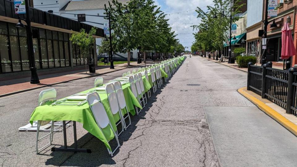 A look down the long row of tables set up on East Main Street for the Belleville Chamber’s 100th anniversary celebration