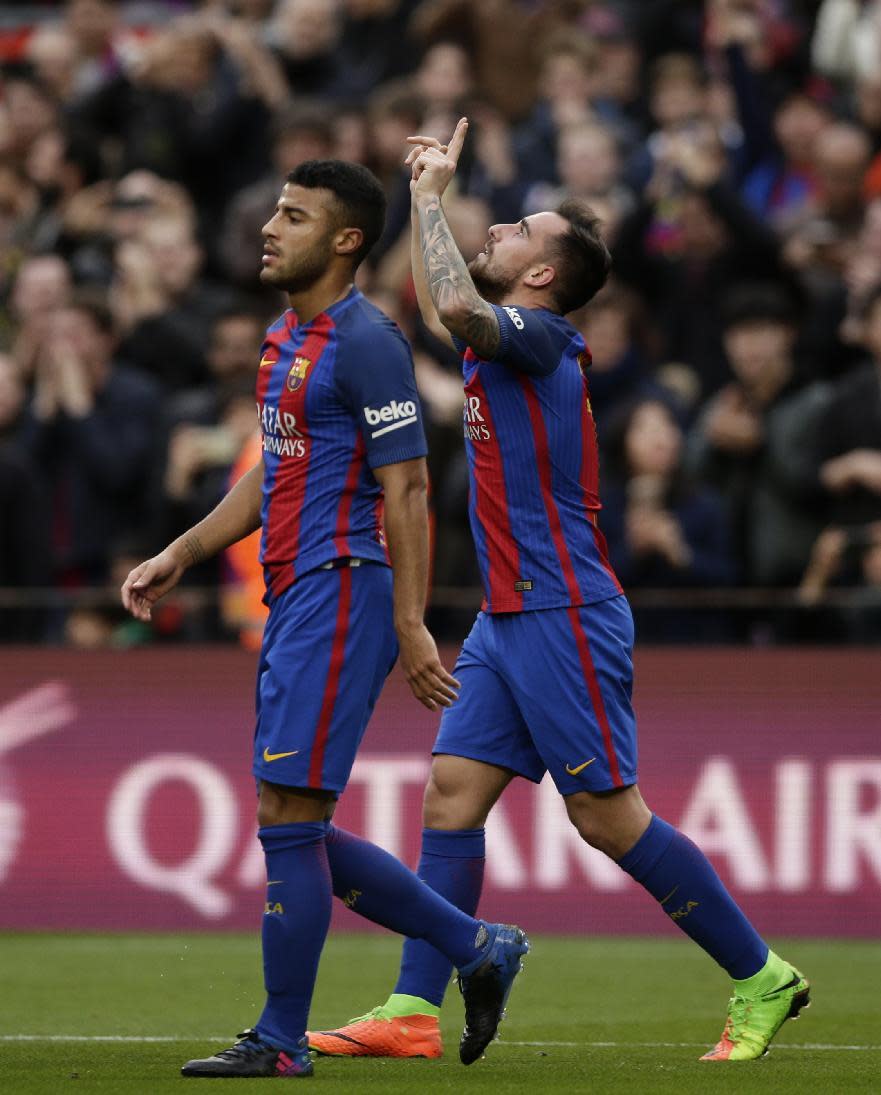 FC Barcelona's Paco Alcacer, right, celebrates after scoring during the Spanish La Liga soccer match between FC Barcelona and Athletic Bilbao at the Camp Nou in Barcelona, Spain, Saturday, Feb. 4, 2017. (AP Photo/Manu Fernandez)