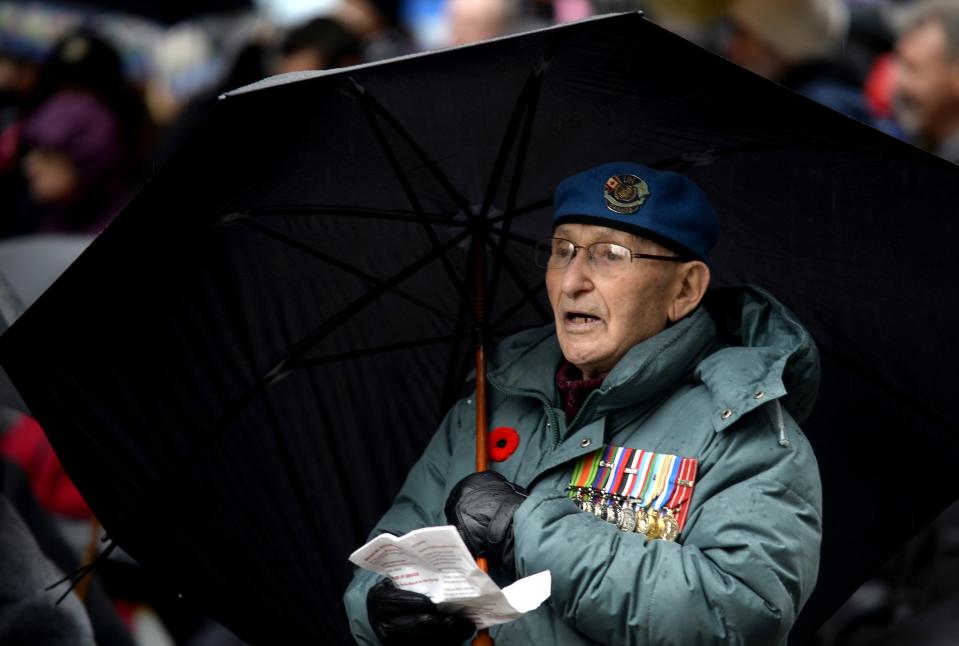 Leonard Pelletier, 90, sings during Remembrance Day ceremonies at Old City Hall in Toronto November 11, 2013. REUTERS/Aaron Harris (CANADA - Tags: POLITICS ANNIVERSARY MILITARY)