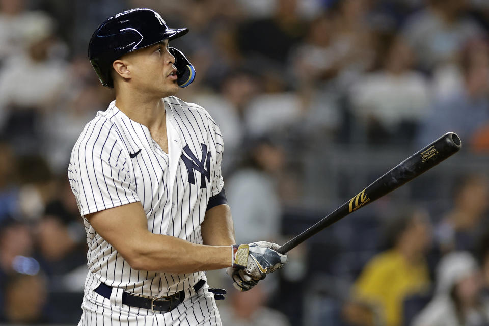 New York Yankees designated hitter Giancarlo Stanton hits a two-run home run against the Detroit Tigers during the sixth inning of a baseball game Tuesday, Sept. 5, 2023, in New York. The home run was Stanton's 400th in the majors. (AP Photo/Adam Hunger)