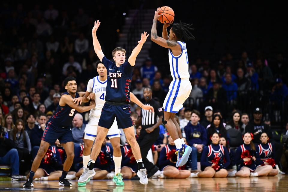 Dec 9, 2023; Philadelphia, Pennsylvania, USA; Kentucky Wildcats guard Rob Dillingham (0) shoots the ball against Penn Quakers guard Sam Brown (11) in the first half at Wells Fargo Center. Mandatory Credit: Kyle Ross-USA TODAY Sports