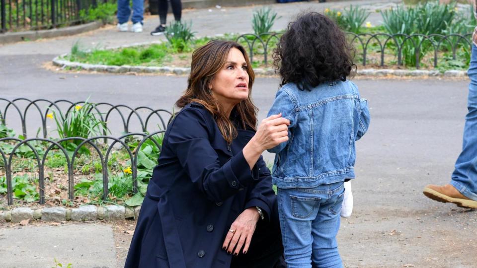 PHOTO: Mariska Hargitay is seen taking a break from filming 'Law and Order: SVU' as she helps a child at the Fort Tryon Playground, on April 10, 2024, in New York. (Jose Perez/bauer-griffin/GC via Getty Images)