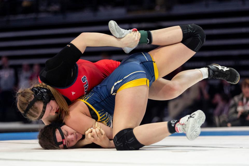 Bonneville’s Hannah Bowler and Springville’s Hayley Harris compete in the 5A Girls Wrestling State Championships at the UCCU Center in Orem on Thursday, Feb. 15, 2024. | Marielle Scott, Deseret News