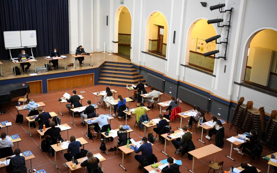 An exam taking place under coronavirus regulations at a secondary school in Berlin - Annegret Hilse/Reuters