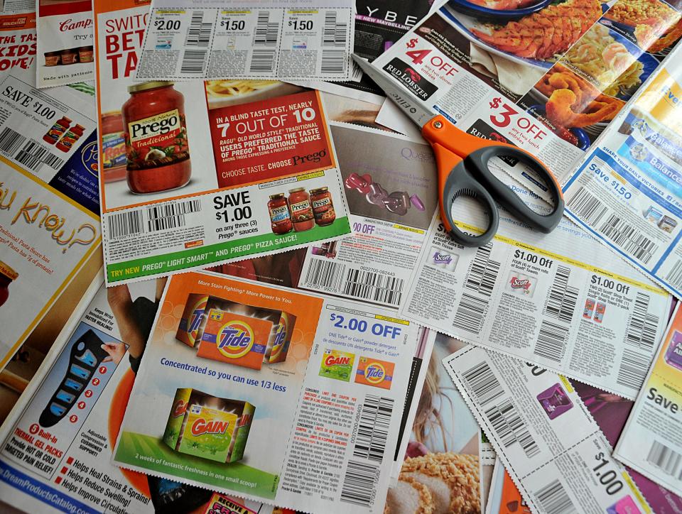 With AFP Story by Fabienne Faur: Lifestyle-US-economy-consumer Coupons from the advertising section of the Sunday newspaper September 13, 2011 in Washington, DC. The humble coupon -- which is the past gave consumers a few cents off soap or cereal -- has mushroomed into a lifestyle for millions of Americans with its own television programs, websites and trading platforms.