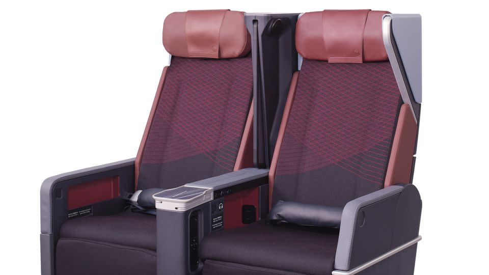 The new JAL premium economy seats have privacy partitions and electronic leg rests. - Japan Airlines