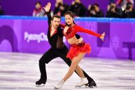 <p>South Korea’s Yura Min and South Korea’s Alexander Gamelin compete in the figure skating team event ice dance short dance during the Pyeongchang 2018 Winter Olympic Games at the Gangneung Ice Arena in Gangneung on February 11, 2018. / AFP PHOTO / Mladen ANTONOV </p>