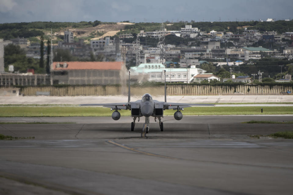In this June 29, 2017 photo made available by the U.S. Air Force, an F-15 fighter plane taxis back to the hangar at Kadena Air Base, Japan. The Defense Department has been figuring out how to provide help and justice when the children of service members sexually assault each other on military bases since Congress required reforms in 2018. Those reforms are starting to rollout, but as one current case at Kadena shows, that rollout has been uneven. (Airman 1st Class Greg Erwin/U.S. Air Force via AP)