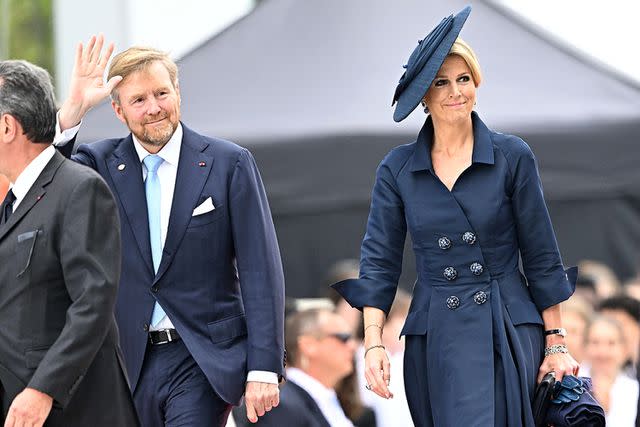 <p>Abd Rabbo-Blondet-Niviere/Shutterstock </p> King Willem-Alexander and Queen Maxima of the Netherlands at D-Day event on June 6, 2024