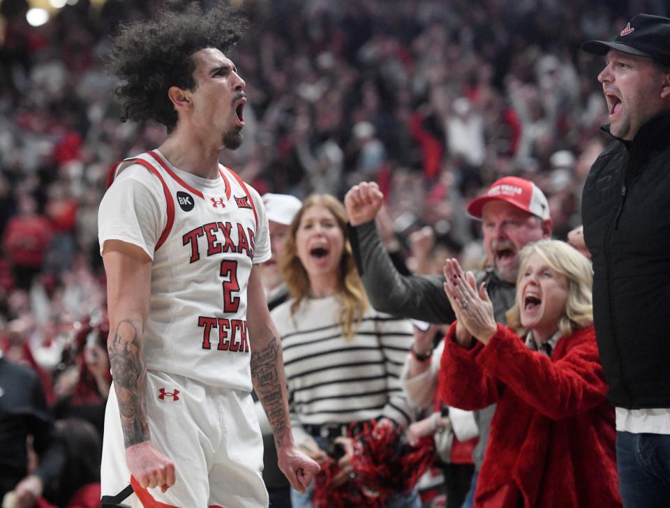 Texas Tech's guard Pop Isaacs (2) reacts after scoring a 3-pointer against BYU in a Big 12 basketball game, Saturday, Jan. 20, 2024, at United Supermarkets Arena.