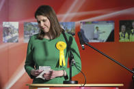 Lib Dem leader Jo Swinson, second right, reacts as she loses her East Dumbartonshire constituency, during the count at the Leisuredome, Bishopbriggs, Scotland, Friday Dec. 13, 2019. (Jane Barlow/PA via AP)