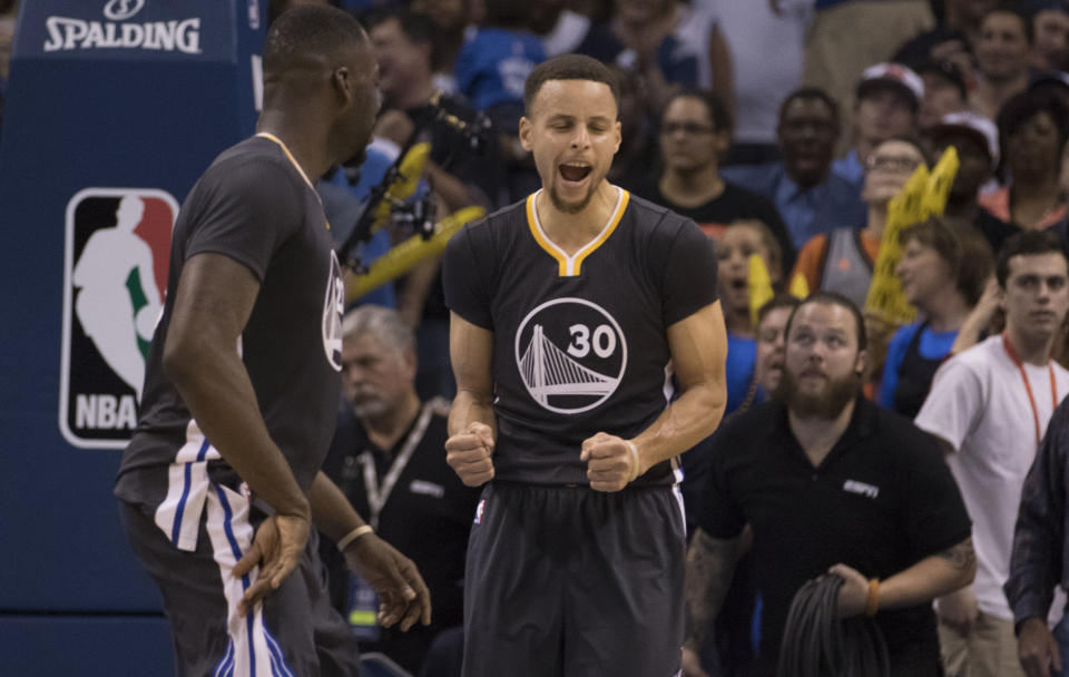 OKLAHOMA CITY, OK - FEBRUARY 27: Stephen Curry #30 of the Golden State Warriors celebrates after tying the game against the Oklahoma City Thunder during the fourth period of a NBA game at the Chesapeake Energy Arena on February 27, 2016 in Oklahoma City, Oklahoma. The Warriors won 121-118 in overtime. NOTE TO USER: User expressly acknowledges and agrees that, by downloading and or using this photograph, User is consenting to the terms and conditions of the Getty Images License Agreement. (Photo by J Pat Carter/Getty Images)