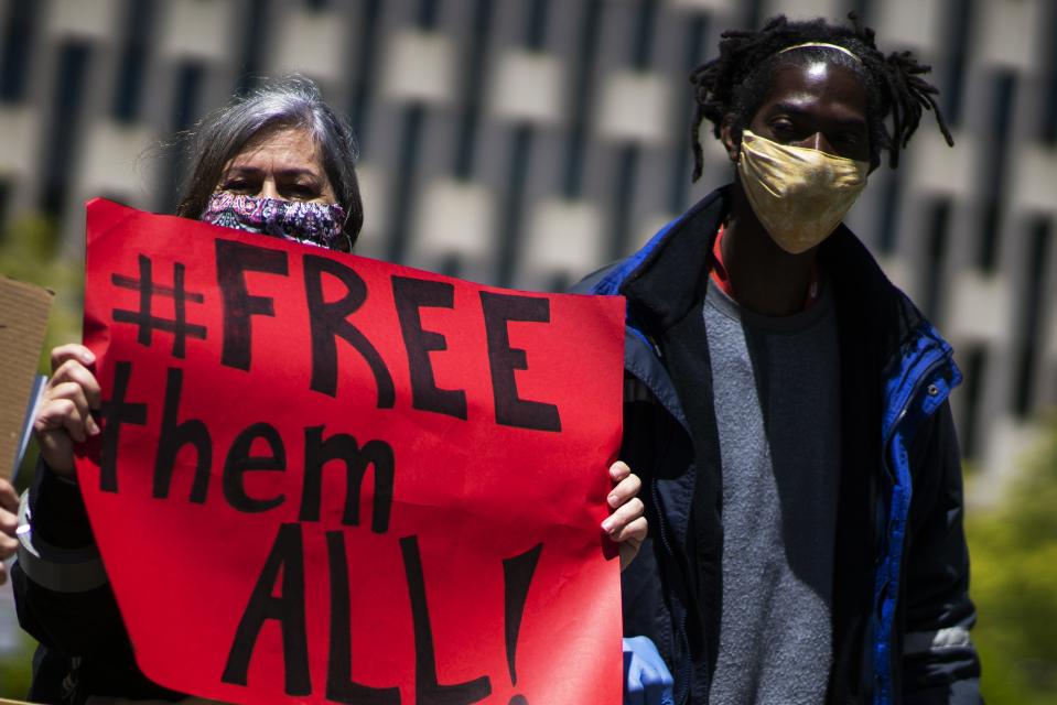 People take part in a protest near a U.S. Immigration building on May 13, 2020, in New York City. Protesters were demanding an end to the continued detention and deportation of non-U.S. Citizens. Conditions within detention centers guarantee exposure to COVID-19 and detainees who have tested positive for COVID-19 are still being deported.