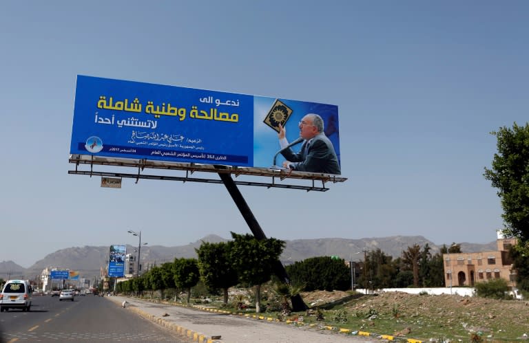 A poster bearing the portrait of Yemen's ex-president Ali Abdullah Saleh and announcing the 35th anniversary of the establishment of his party is seen in the capital Sanaa on August 19, 2017