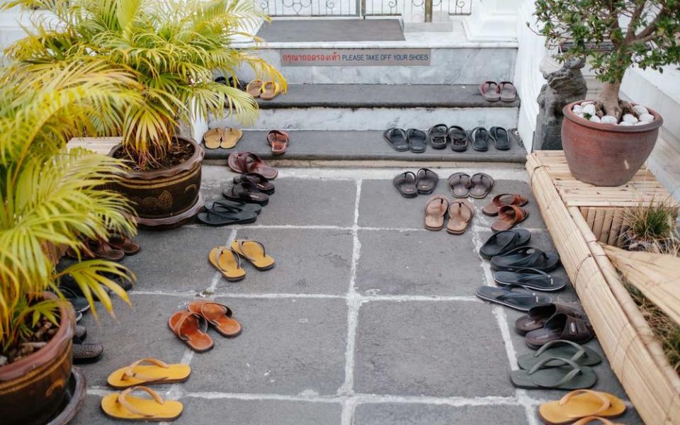 Monk’s sandals outside of temple, Bangkok. | Stan Nalewski