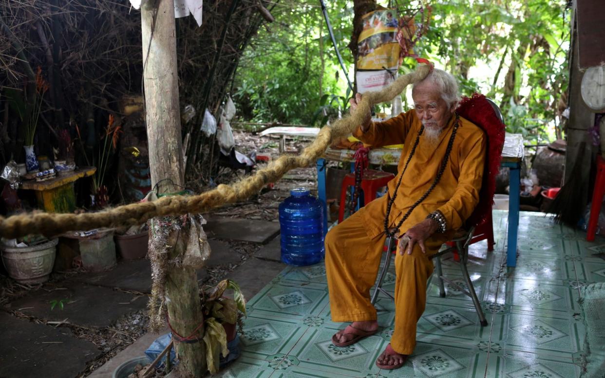 Mr Chien and his 5m dreadlocks - REUTERS