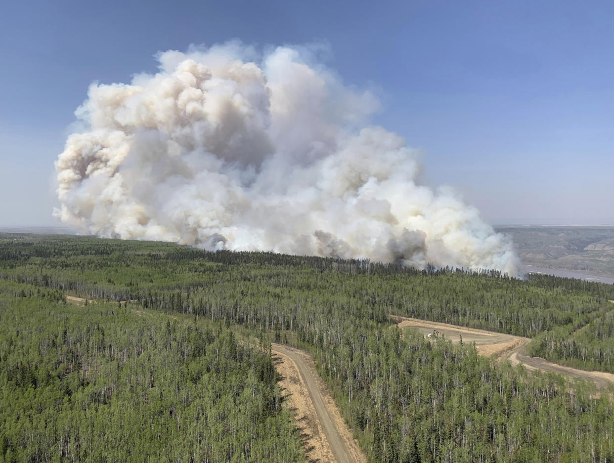 FILE - In this photo provided by the Government of Alberta Fire Service, a wildfire burns a section of forest in the Grande Prairie district of Alberta, Canada, Saturday, May 6, 2023. An early May heat wave this weekend could surpass daily records in parts of the Pacific Northwest. The National Weather Service has issued an excessive heat warning for much of the western parts of both Oregon and Washington. (Government of Alberta Fire Service/The Canadian Press via AP,File)