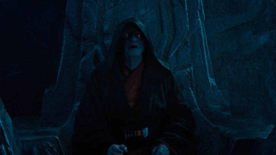 Ian McDiarmid sits in a dark and threatening chamber in Star Wars :The Rise of Skywalker.