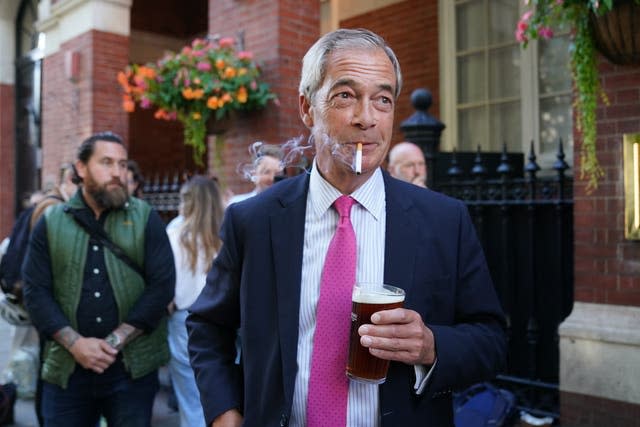 UK leader Nigel Farage reformed with a cigarette and a pint in central London