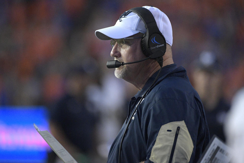 Charleston Southern head coach Mark Tucker watches from the sideline during the first half of an NCAA college football game against Florida Saturday, Sept. 1, 2018, in Gainesville, Fla. (AP Photo/Phelan M. Ebenhack)