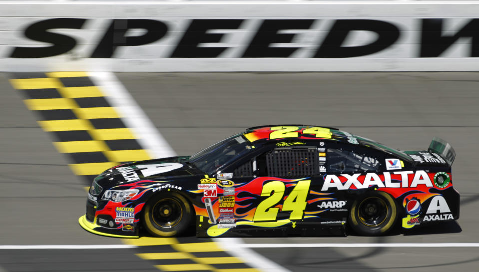 Driver Jeff Gordon (24) takes a practice lap Friday, May 9, 2014, at Kansas Speedway in Kansas City, Kan., for Saturday night's NASCAR Sprint Cup series auto race. (AP Photo/Colin E. Braley)