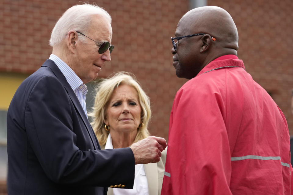 President Joe Biden talks with Rolling Fork, Miss., Mayor Eldridge Walker, right, as he and first lady Jill Biden arrive to survey the damage after a deadly tornado and severe storm moved through the area in Rolling Fork, Miss., Friday, March 31, 2023. (AP Photo/Carolyn Kaster)