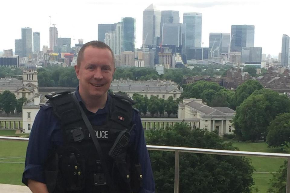 Hero: PC Neil Dobson ran in and saved the residents: Met Police