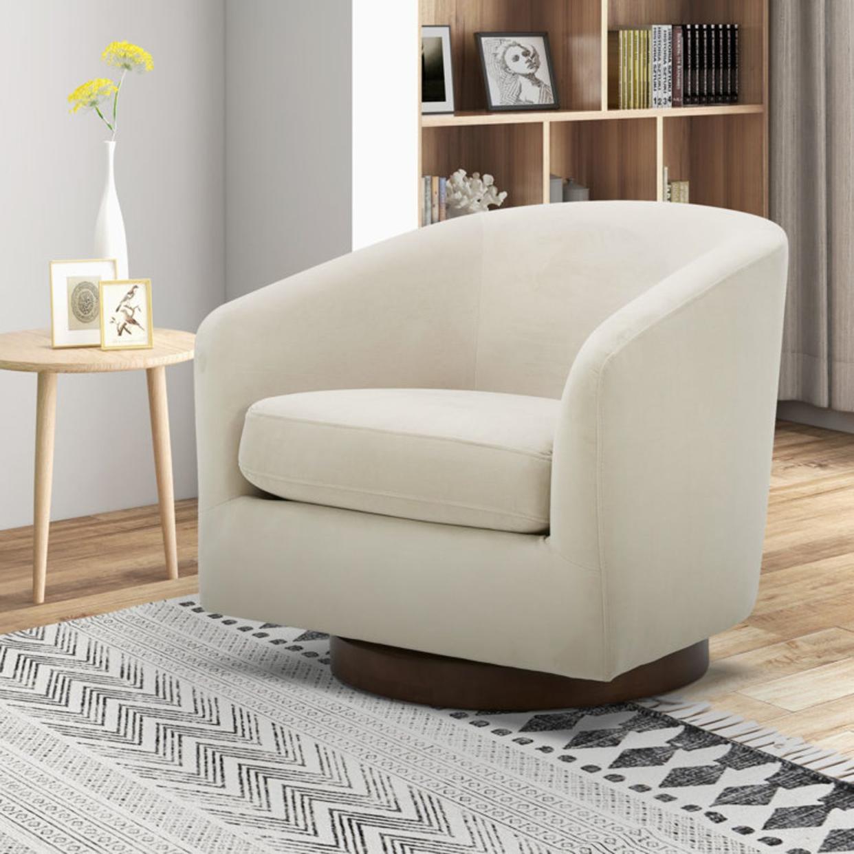 <p><a href="https://go.redirectingat.com?id=74968X1596630&url=https%3A%2F%2Fwww.wayfair.com%2F--%2Fpdp%2Fallmodern--bennett-upholstered-swivel-barrel-chair-x113715824-l54-w002604713.html&sref=https%3A%2F%2Fwww.cosmopolitan.com%2Flifestyle%2Fg46903076%2Fbest-swivel-chairs%2F" rel="nofollow noopener" target="_blank" data-ylk="slk:Shop Now;elm:context_link;itc:0;sec:content-canvas" class="link rapid-noclick-resp">Shop Now</a></p><p>Bennett Upholstered Swivel Barrel Chair</p><p>wayfair.com</p><p>$570.00</p>