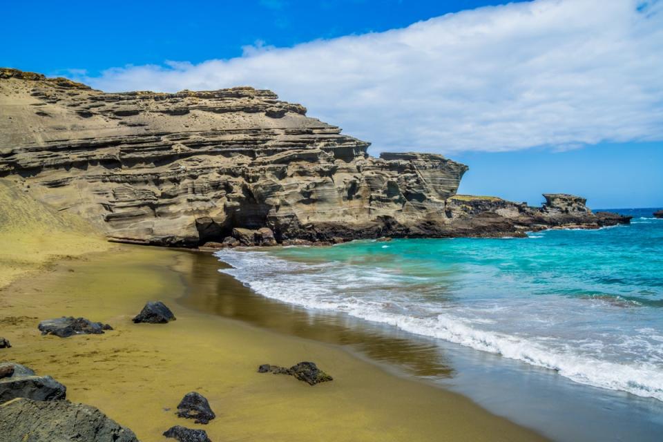 Green sand at Papakōlea Beach on Hawaii’s Big Island (Getty Images/iStockphoto)