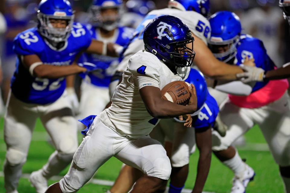 Trinity Christian Academy's Darnell Rogers (4) rushes for yards during the fourth quarter of a regular season high school football game Friday, Oct. 7, 2022 at Riverside High School in Jacksonville. Trinity Christian Academy defeated the Riverside Generals 30-14. 