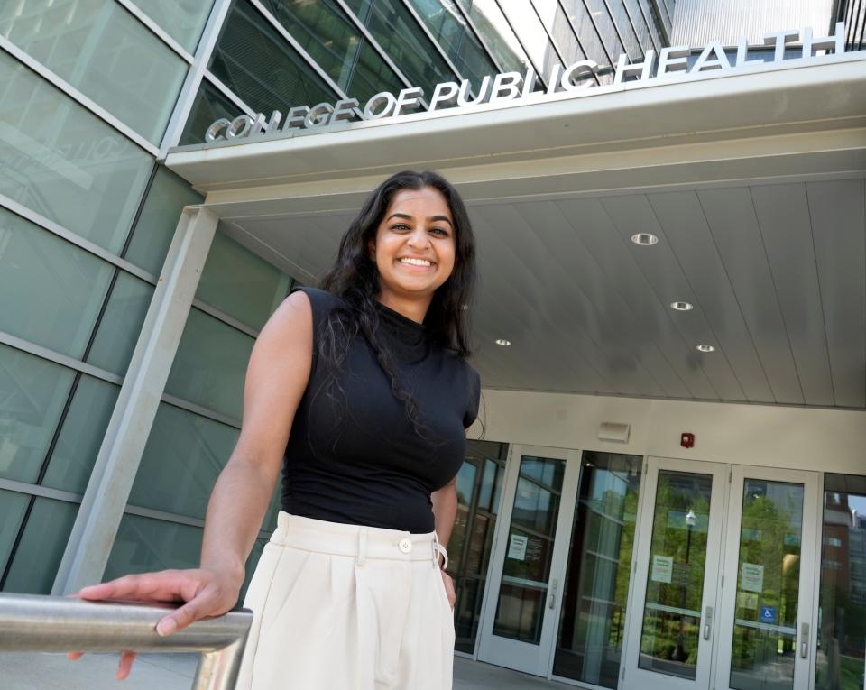 Nandini Rangan, who will graduate with a bachelor's degree and a master's degree in public health from Ohio State University on Sunday sits outside the College of Public Health on campus. Rangan said the turmoil of the pandemic and the last four years have prepared her for whatever comes next in her life and career.