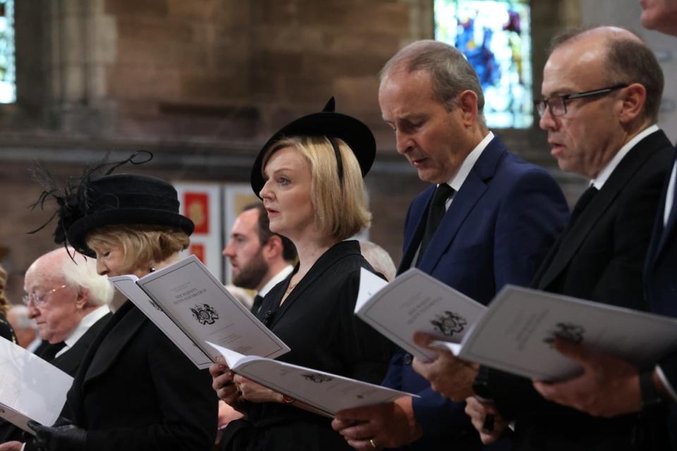 President Michael D Higgins and his wife Sabina, Prime Minister Liz Truss, Taoiseach Micheal Martin and Secretary of State Chris Heaton-Harris at the service (Liam McBurney/PA) (PA Wire)