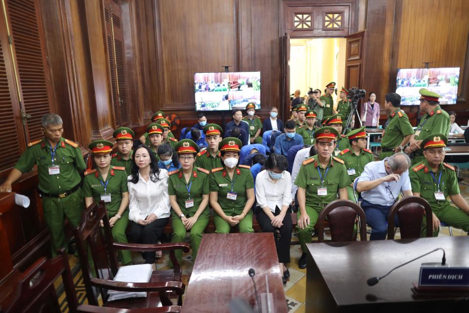 Vietnamese property tycoon Truong My Lan (front row 3nd L) looks on at a court in Ho Chi Minh city, April 11, 2024. / Credit: STR/AFP/Getty