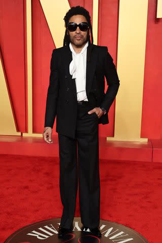 <p>Jamie McCarthy/WireImage</p> Lenny Kravitz attends the 2024 Vanity Fair Oscar party.