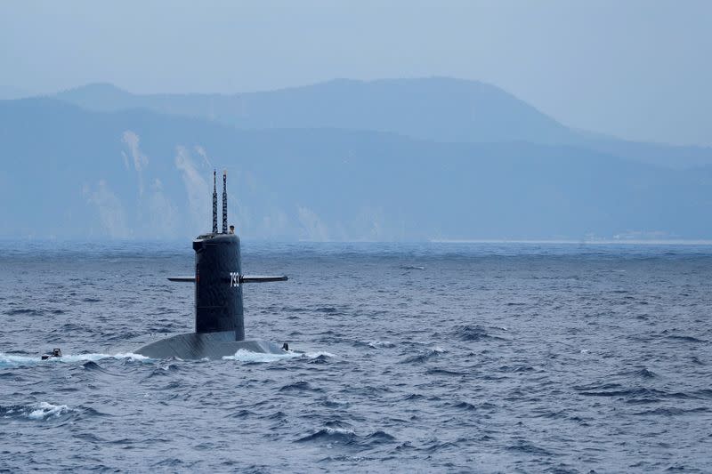 FILE PHOTO: The Hai Lung SS-793 diesel-electric submarine emerges from underwater during a during a drill near Yilan naval base