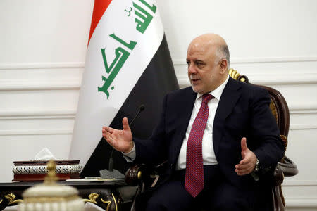 Iraq's Prime Minister Haider al-Abadi speaks with Secretary of State Rex Tillerson (not pictured) in Baghdad, Iraq October 23, 2017. REUTERS/Alex Brandon/Pool